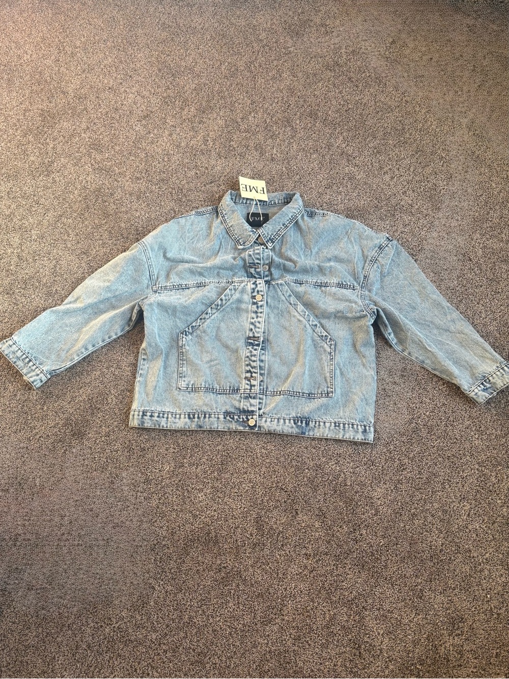 Blue jean jacket with buttons